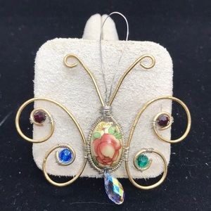Pretty wire wrapped Butterfly pendant.